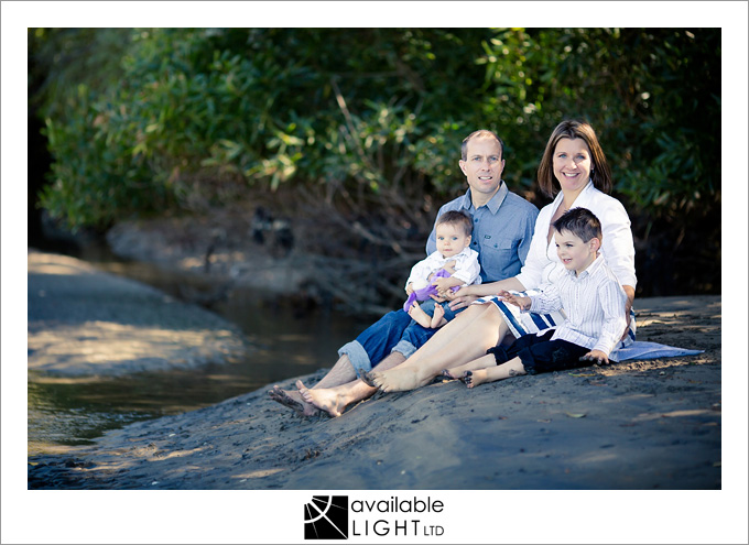 family beside a stream north shore family photographer